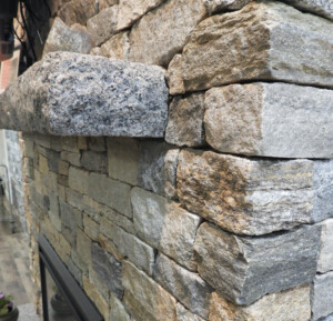 Littleton MA Stoneyard Showroom Fireplace - Close-up Corner and Mantel Unmistaken Stonecraft MA and Southern NH thin stone veneer masonry