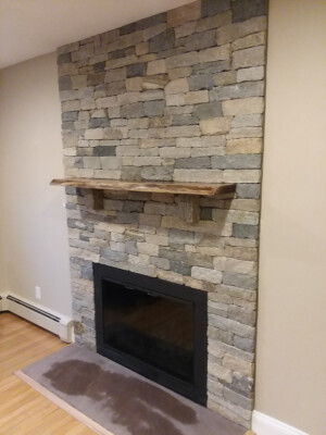 Sudbury MA Boston Blend Ledgestone - Live Edge Black Walnut Mantel Unmistaken Stonecraft MA and Southern NH